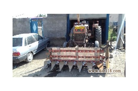 دروگر جلوی تراکتوری بافه بند دار گندم 
